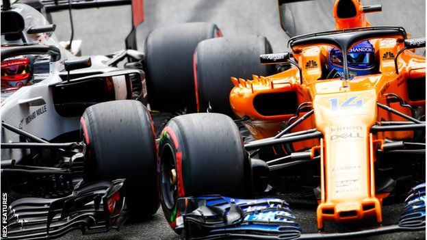 Kevin Magnussen and Fernando Alonso clash on track during Italian GP qualifying