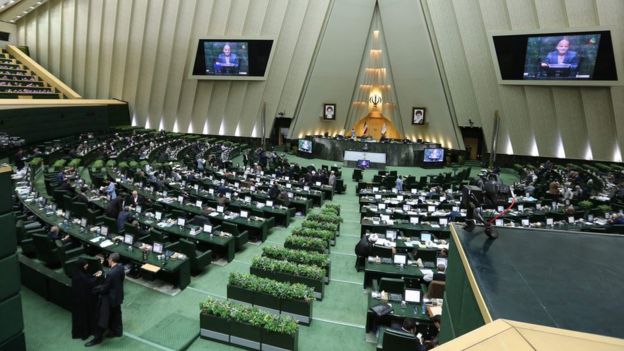 This file photo taken on March 01, 2016 shows Iranian MPs attending a parliament session in Tehran on March 1, 2016.