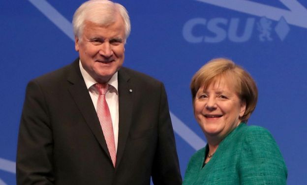 Horst Seehofer (L), Governor of Bavaria and leader of the Bavarian Christian Social Union (CSU), and German Chancellor and leader of the German Christian Democrats (CDU) Angela Merkel