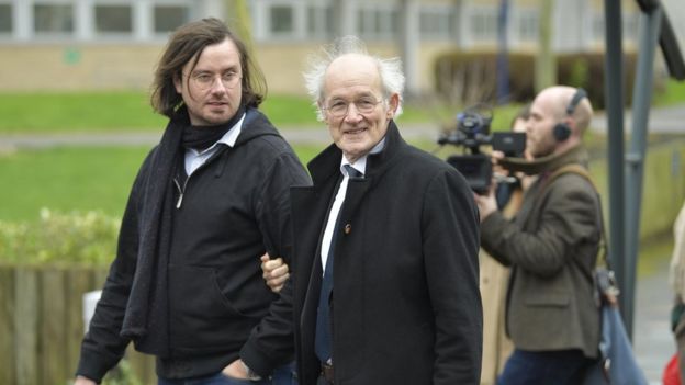 Julian Assange's brother and father - arriving at court