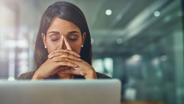  Female in front of a computer 