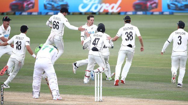 Mitchell Santner celebrates after taking final wicket of Naseem Shah