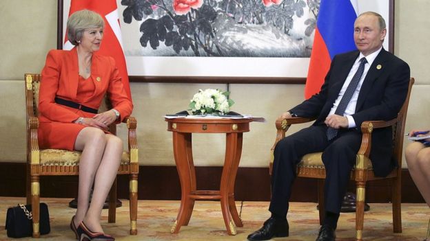 Theresa May y Vladimir Putin.