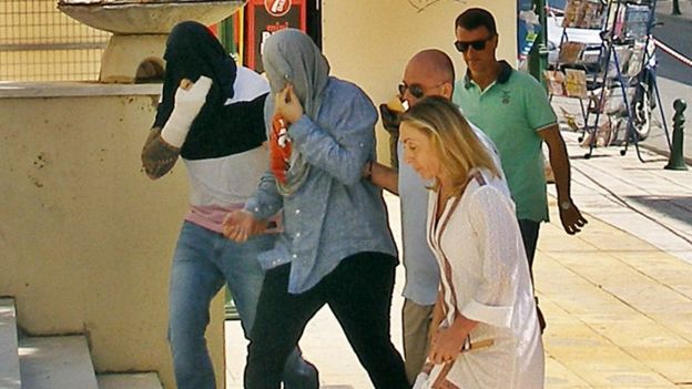 Two of the nine men suspected of murdering a 22-year old American tourist, arrive at court on the island of Zakynthos, Greece, 11 July 2017