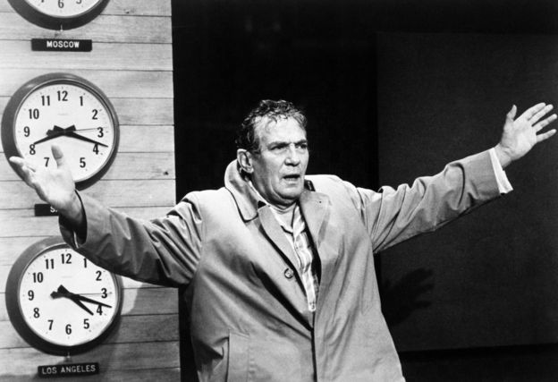 Peter Finch as Howard Beale in Network