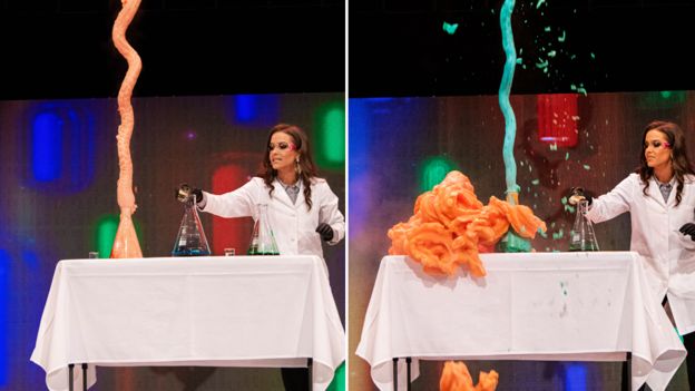 Camille Schrier in the middle of her experiment on stage