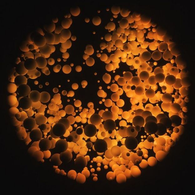 Imagem abstrata de esferas orgânicas ilustra o conceito da origem e multiplicação da vida