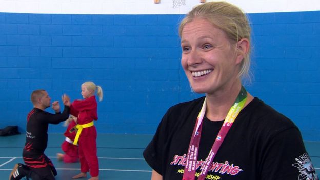 Dundonald girl becomes stick fighting champion - BBC News