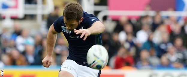 Greig Laidlaw kicks a penalty for Scotland against Samoa