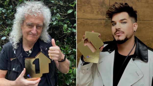 The band were presented with official number one trophies