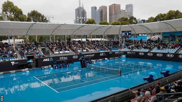 A rain-soaked outside court at the Australia Open