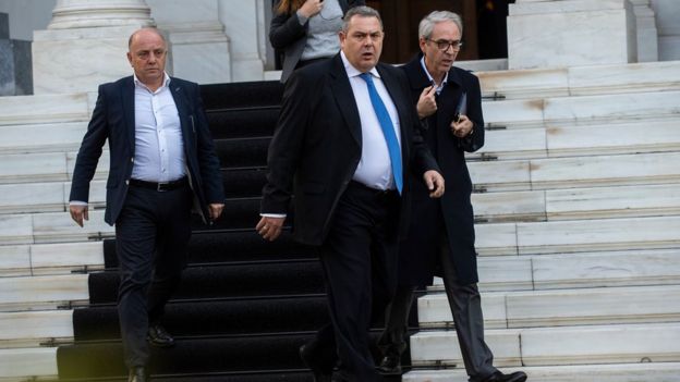 Panos Kammenos (centre) leaves the Maximos Mansion after a meeting with Greek Prime Minister Alexis Tsipras in Athens on January 13, 2019