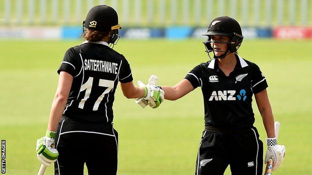 New Zealand batters Amy Satterthwaite (left) and Amelia Kerr (right) shake hands after beating England in the third ODI
