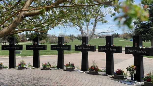 Crosses with the names and portraits of the victims at Chapel Hill Memorial Gardens, also in Littleton, Colorado