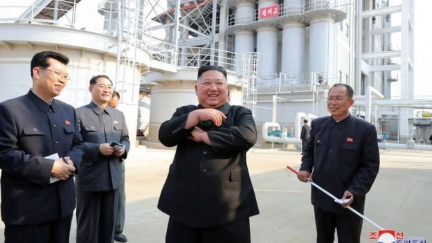 Kim Jong-un pictured by state media opening a fertiliser factory 1 May 2020