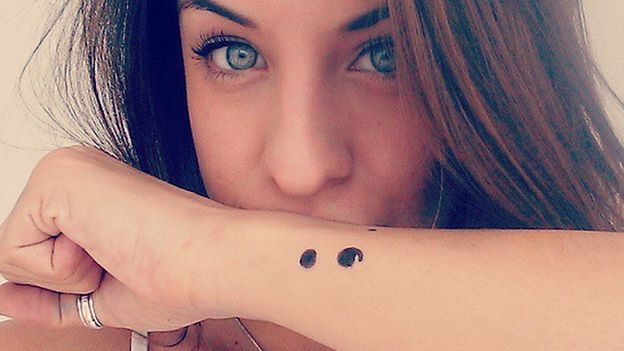 picture of women with semicolon tattoo