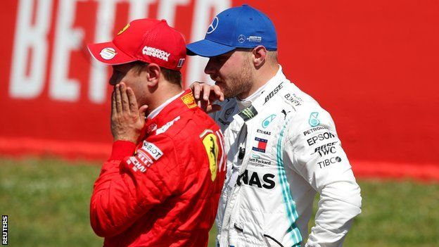 Ferrari's Sebastian Vettel and Mercedes' Valtteri Bottas after qualifying