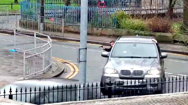 Manchester drive-by gunman caught shooting out of car window - BBC News