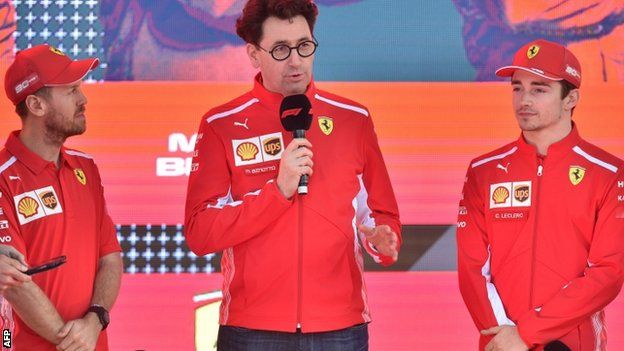 Sebastian Vettel, Ferrari team principal Mattia Binotto and Charles Leclerc