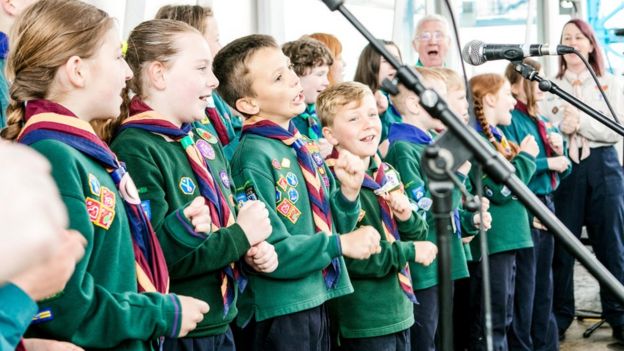 Scouts sing campfire songs