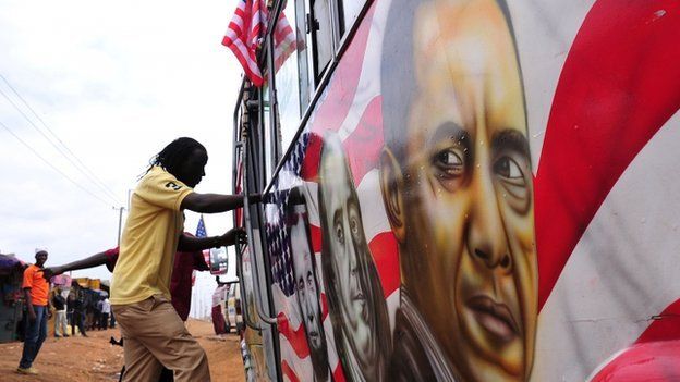 Man boards a "matatu" minibus with a painting depicting US Presidents Abraham Lincoln and Barack Obama and US scientist Benjamin Franklin