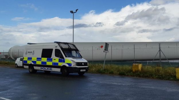 Police van coming to the port