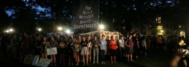 Protesters and students gather at a rally before they toppled a statue of a Confederate soldier nicknamed "Silent Sam"