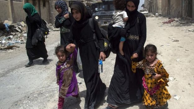 Women and children flee Mosul's Old City. Photo: 3 July 2017