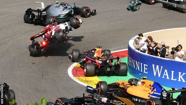 Verstappen and Raikkonen collide on the opening lap