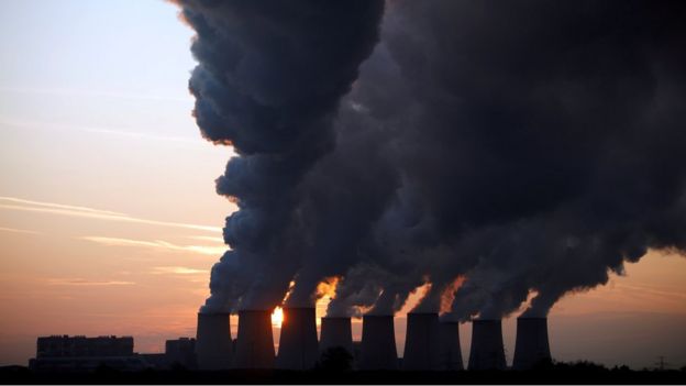 Steam billows from the cooling towers of Vattenfall's Jaenschwalde brown coal power station near Cottbus, Germany, December 2, 2009