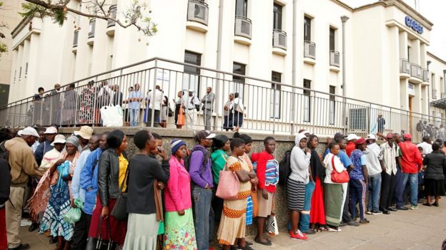 People queuing outside a bank in Harare, Zimbabwe, to get newly released notes - November 2019