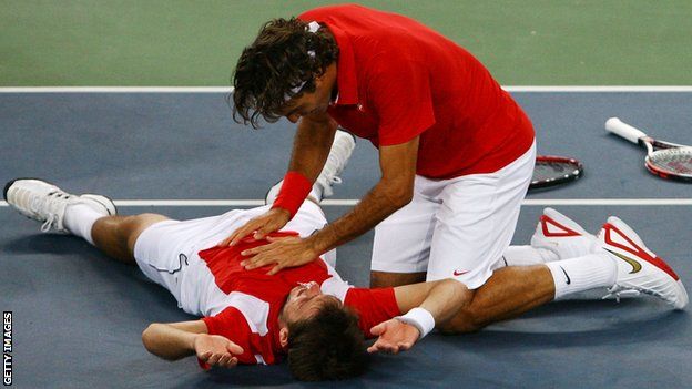 Stan Wawrinka and Roger Federer celebrate Olympic gold