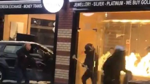 Armed men outside jewellery store