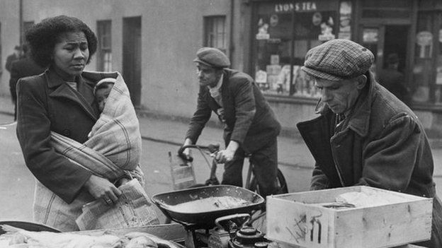 Fishmonger plying his trade on the streets of Tiger Bay