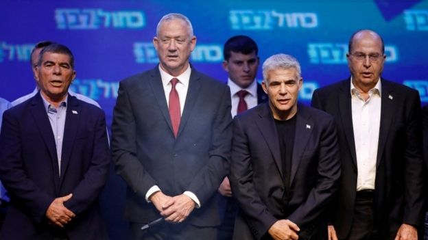 Blue and White party leader Benny Gantz (2nd L) with co-leaders Gaby Ashkenazi (L), Yair Lapid (2nd R) and Moshe Yaalon (R) at an election night rally in Tel Aviv on 18 September 2019 Reuters