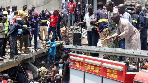 Rescue workers search for survivors at the site of a collapsed building containing a school in Nigeria's commercial capital of Lagos, Nigeria March 13, 2019.