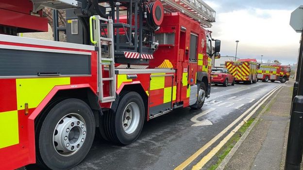 Emergency services try to free person down manhole in Inverness - BBC News