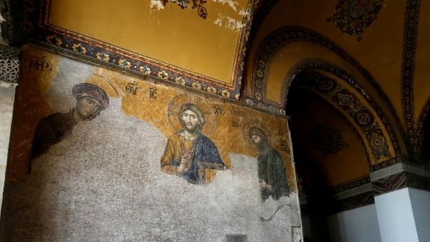Visitors look at mosaics at Hagia Sophia, August 2017