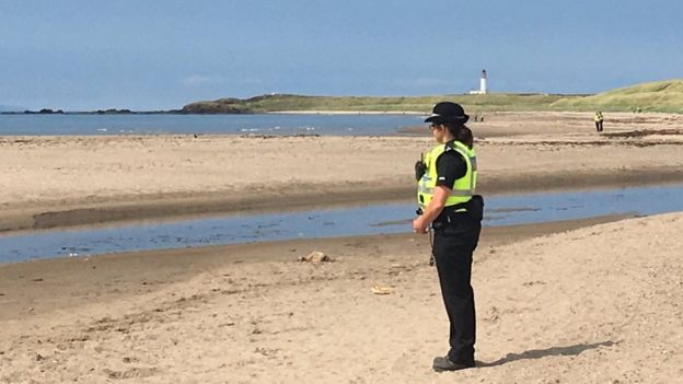 police on beach