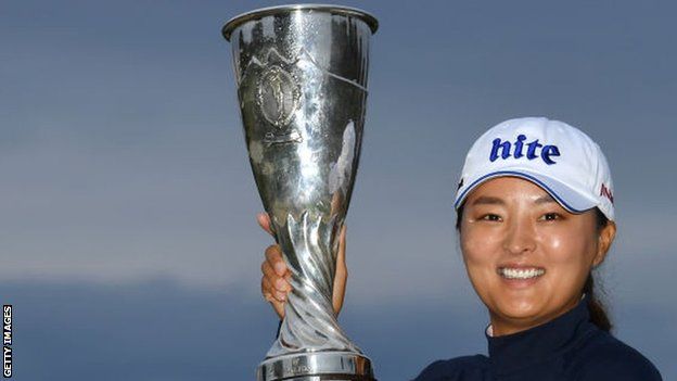 South Korea's Ko Jin-young lifts the Evian Championship trophy