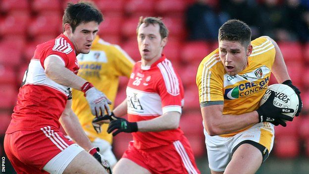 Antrim's Jack Dowling attempts to outwit Derry's Chrissy McKaigue in the Dr McKenna Cup in 2016