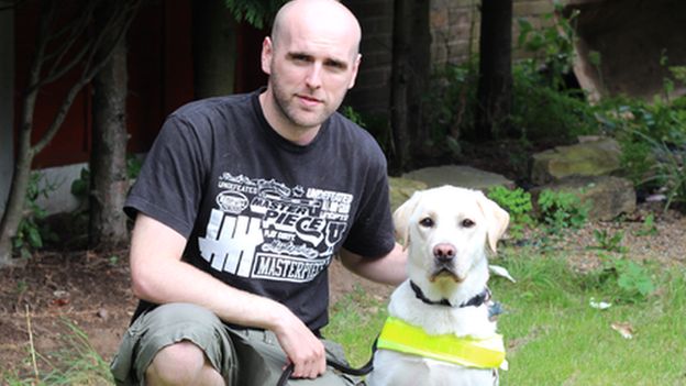 Simon Wheatcroft and Ascot guide dog