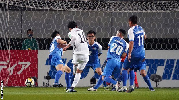 Takumi Minamino scores Japan's first goal against Mongolia