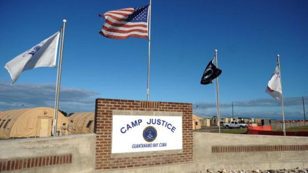 A "Camp Justice" sign near the high-tech, high-security courtroom