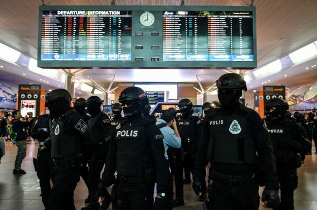 Malaysia's Special Task Force On Organised Crime (STAFOC) arrive to provide security at the low-cost carrier Kuala Lumpur International Airport 2 (KLIA2) during a visit to the scene of the murder as part of the Shah Alam High Court trial for Indonesian defendant Siti Aisyah and Vietnamese defendant Doan Thi Huong on 24 October 2017.