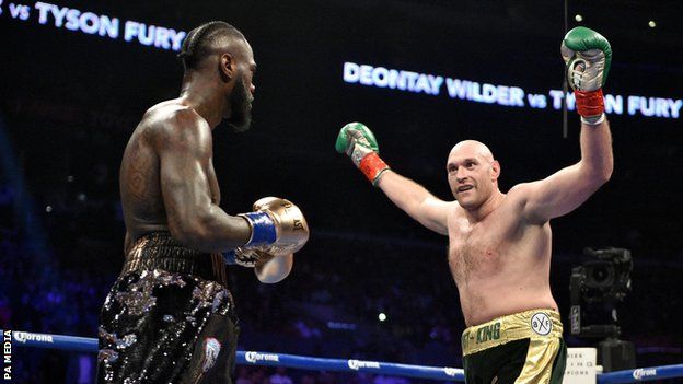 Deontay Wilder and Tyson Fury in their first fight at the Staples Center in Los Angeles, United States