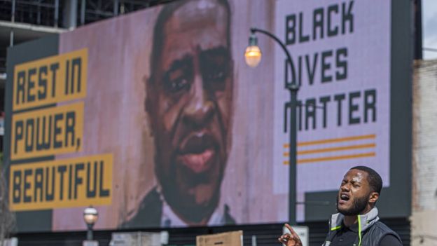 Cartel de Black Lives Matter con el rostro de George Floyd