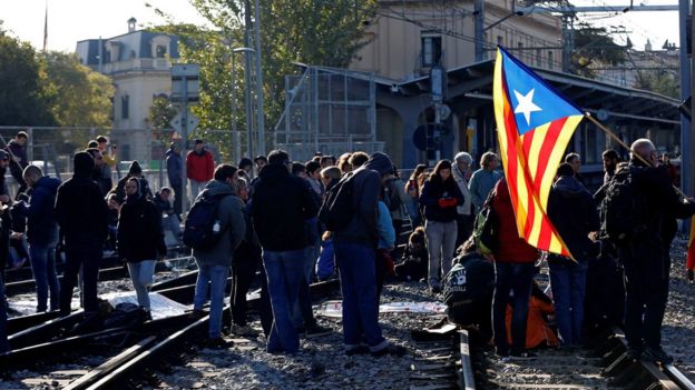 Protesters block a track in in Sant Cugat del Valles, Spain