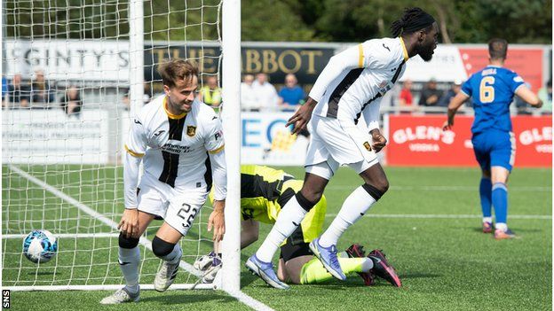 Andrew Shinnie (left) netted 10-man Livingston's leveller as they hit back to beat Cove Rangers