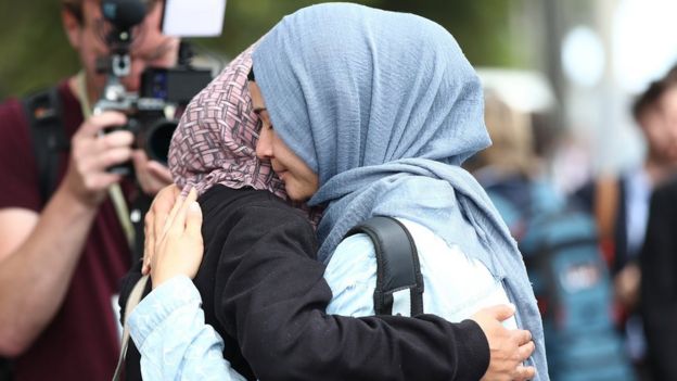 Friends and family of the victims gather at the support centre at the Hagley Community College